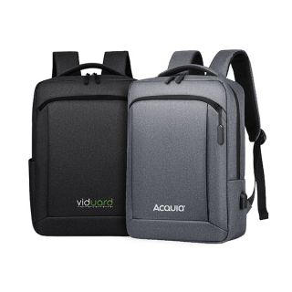 Grey and black 15.6 inch laptop backpacks standing side by side, each printed with a logo on the front panel