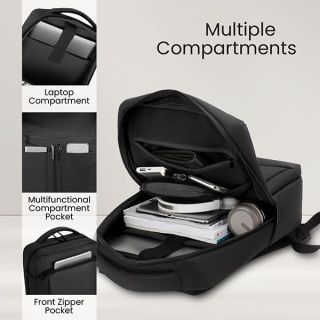 Open black laptop backpack showing the laptop compartment, multifunctional compartment pocket and front zipper pocket holding notebooks and gadgets