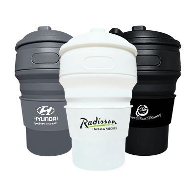 Three collapsible silicone cups in grey, white and black, each with a flip lid and a matching sleeve printed with a logo.