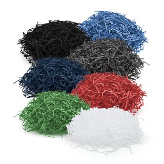 Seven loose piles of shredded paper filler in blue, black, grey, navy, red, green and white