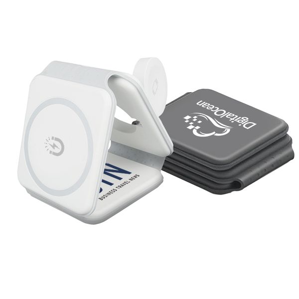 White folding magnetic charger opened into three charging pads, with black folded units stacked behind it, each printed with a logo.