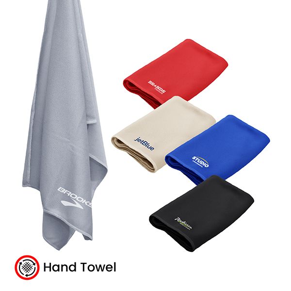 A grey cooling towel hanging with a printed logo, above folded towels in red, cream, blue and black.