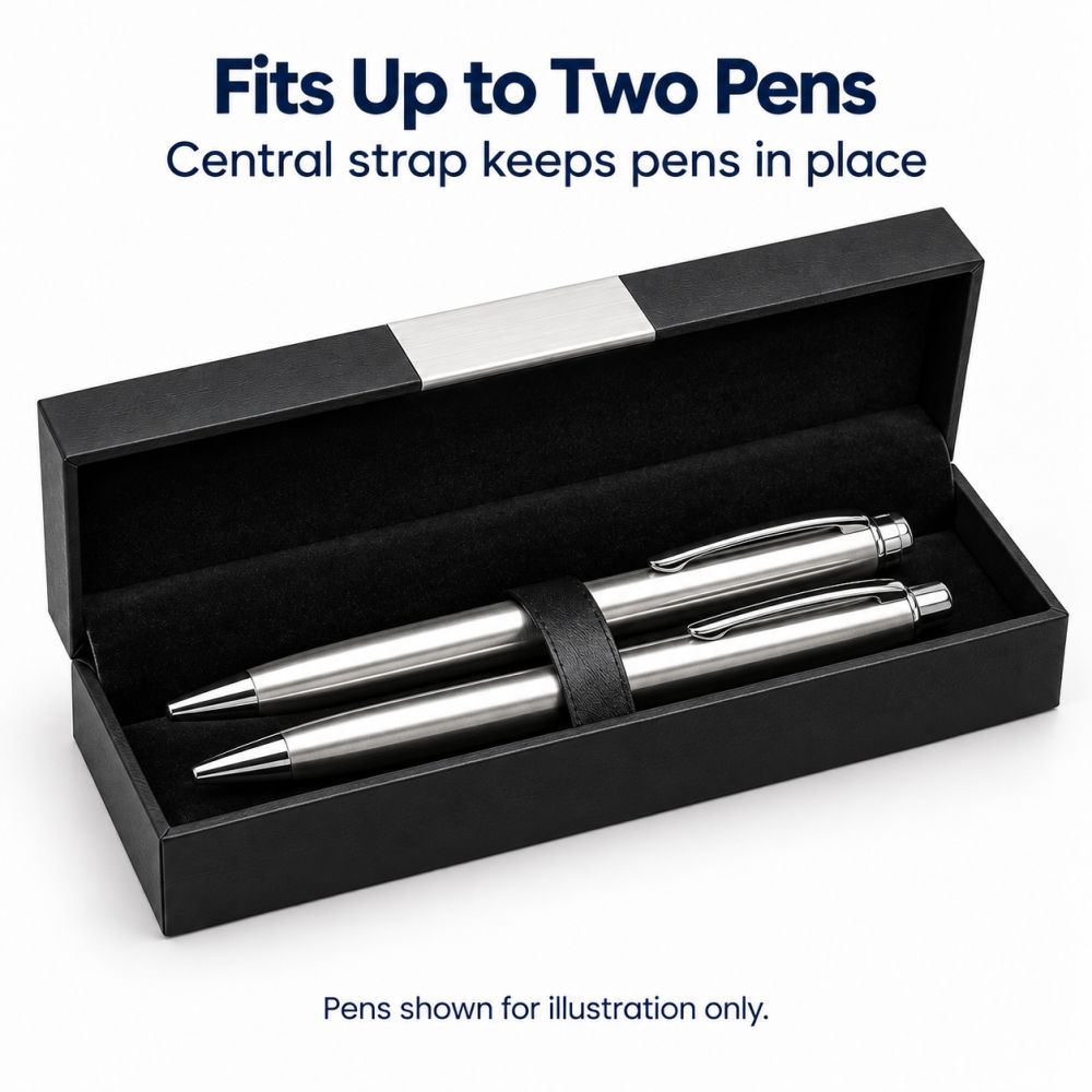 Open black SIGNATURE pen box holding two silver pens side by side under a central strap