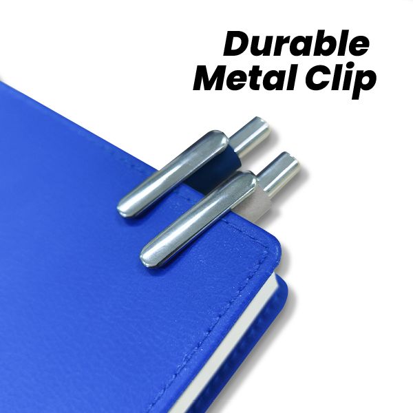 Silver metal clips of two pens clipped onto the edge of a blue notebook cover
