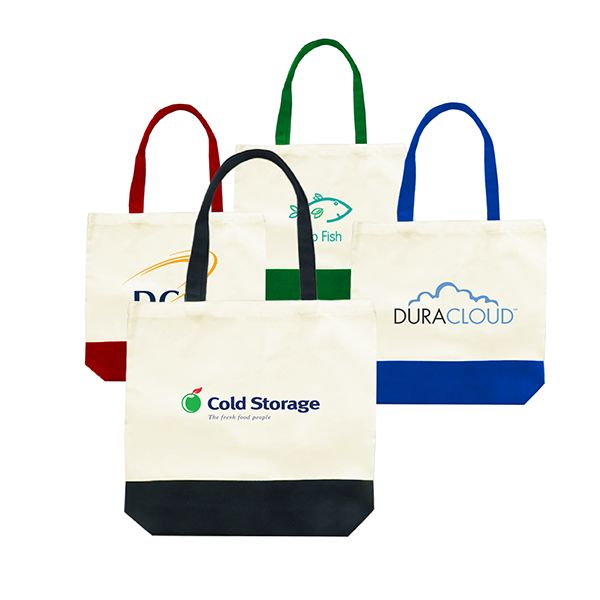 Natural canvas tote bags with a contrast base panel and matching handles in maroon, green, blue and black, each printed with a logo.
